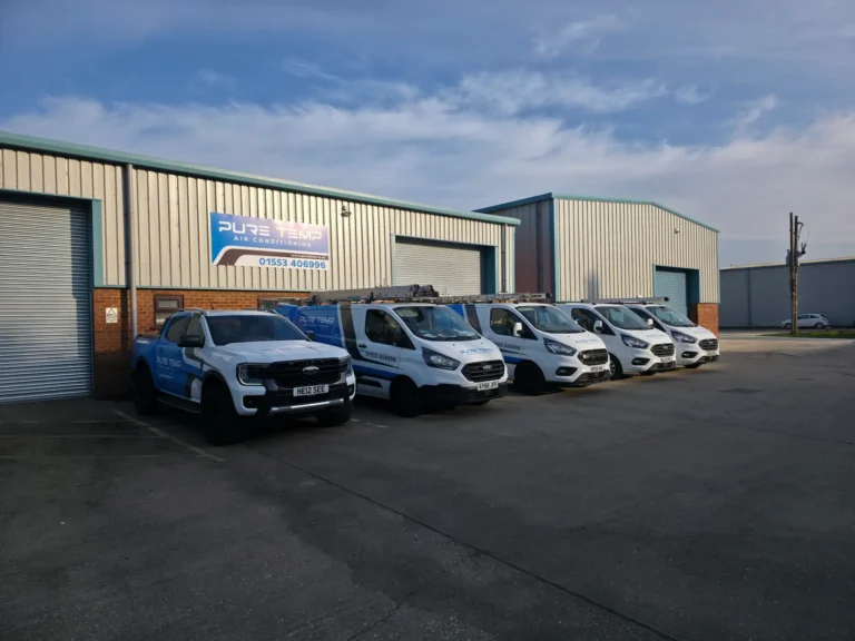 Pure Temp air conditioning service vehicles outside industrial unit